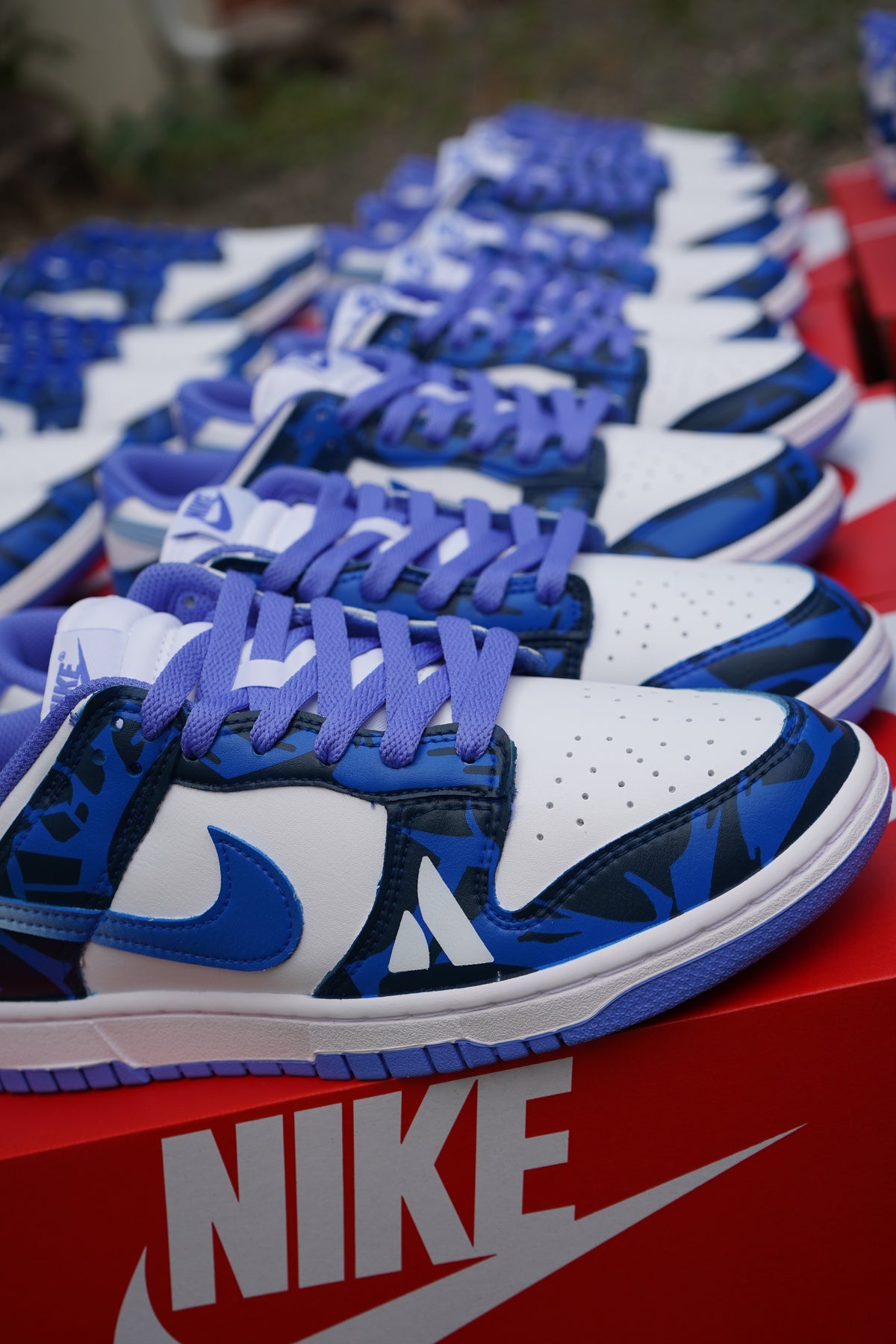 8 pairs of Custom Atlassian Dunks